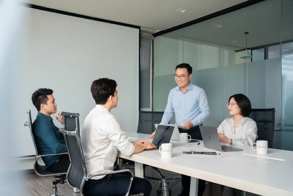 Corporate team meeting at Dreamplex in a professional meeting room setting
