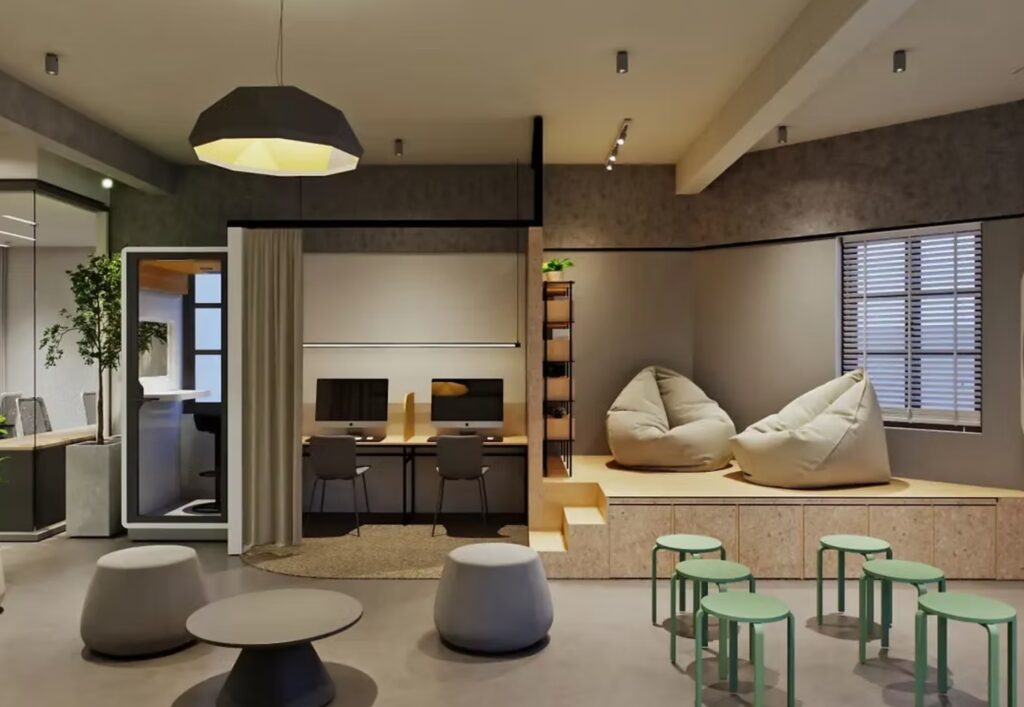 Modern coworking meeting area at WorkFlow Space with shared tables and collaborative seating