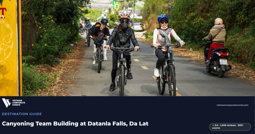 datanla falls team building da lat corporate group abseiling beside a waterfall