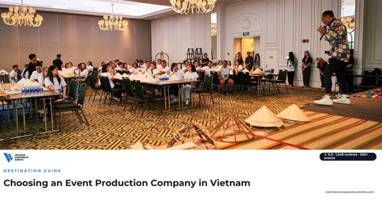 event production company vietnam crew rigging lighting and screens before a corporate event