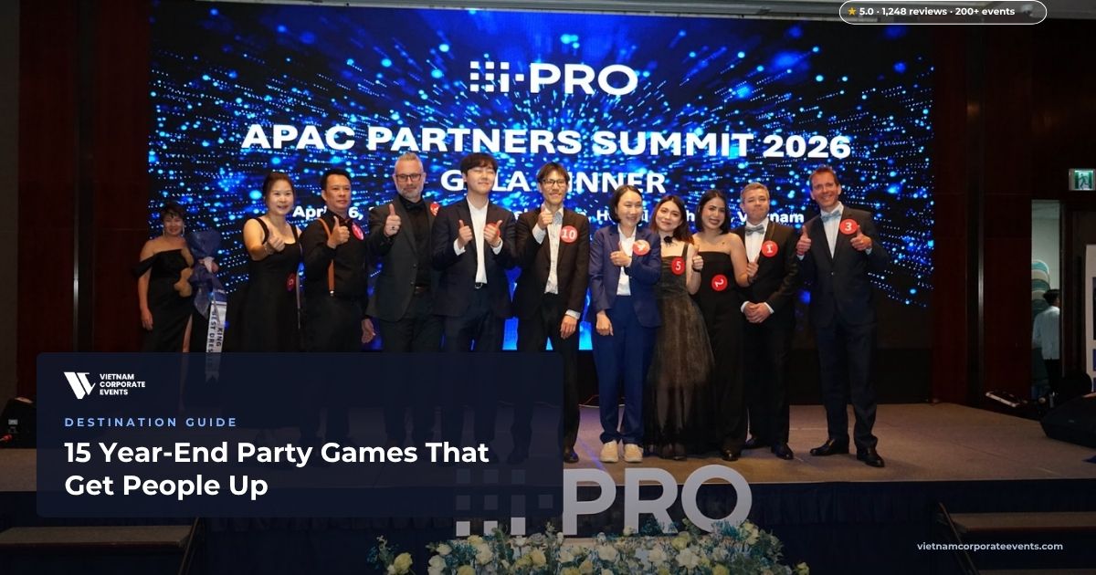 year end party games colleagues competing on stage at a company celebration